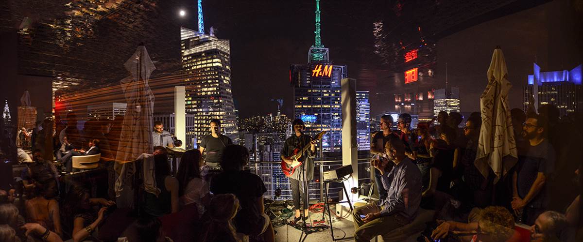 California-based band Bouquet took their audience above the clouds, on the Hyatt roof deck, to serenade them against the city skyline.